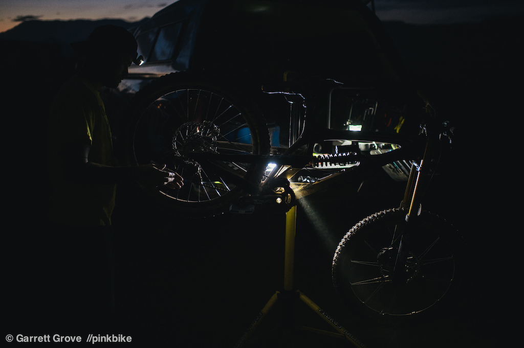 Chris Van Dines bike getting some attention after an end of the day compression on the last big hit at the bottom of the venue.