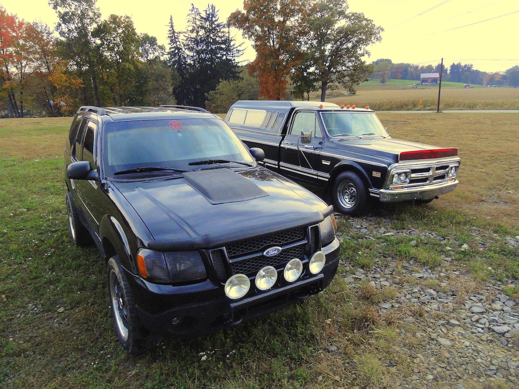 Finally have a picture of both my vehicles together! 72 GMC Sierra Grande &amp; 01 Explorer Sport