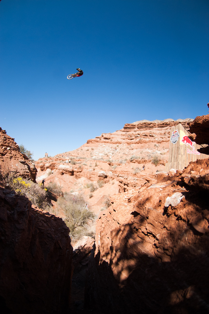 Sending it on the canyon gap at Rampage