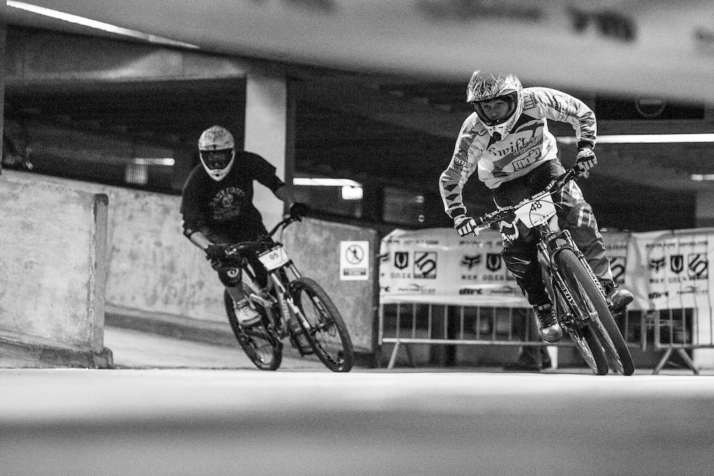 Head to head action, DH Vs Hardtail during Evans Cycles Urban Dual at NCP Multstory Car Park, Cardiff, Wales, United Kingdom. 28October,2012 Photo: Charles Robertson