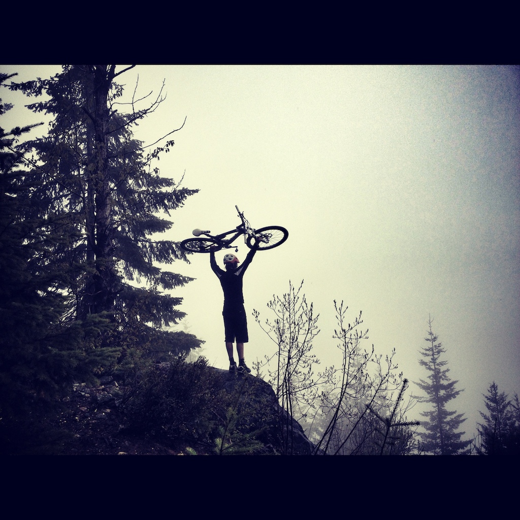 Biking on the flank trail/ billy's epic in the early season fogginess and rain in whistler B.C