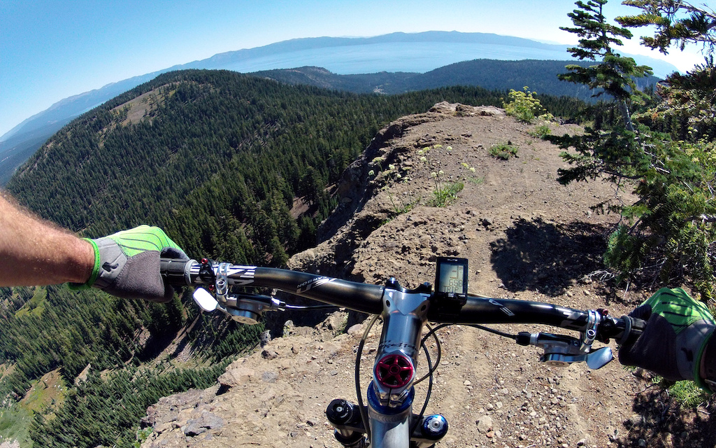 This is off trail, but near Stanford Rock. Riding along an exposed ridge with Lake tahoe in the background.