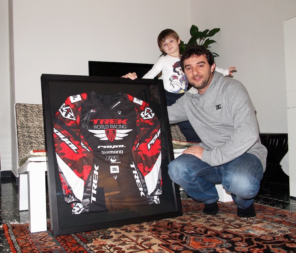 It's in my house!
Arrived few days ago:
Worn, Signed, Framed Aaron Gwin Jersey of th 2012 race season!!!!!!!!! I'm the winner! http://www.pinkbike.com/u/trek/blog/Winner-Worn-Signed-Framed-Aaron-Gwin-Jersey.html

Me and my lady, Margherita.