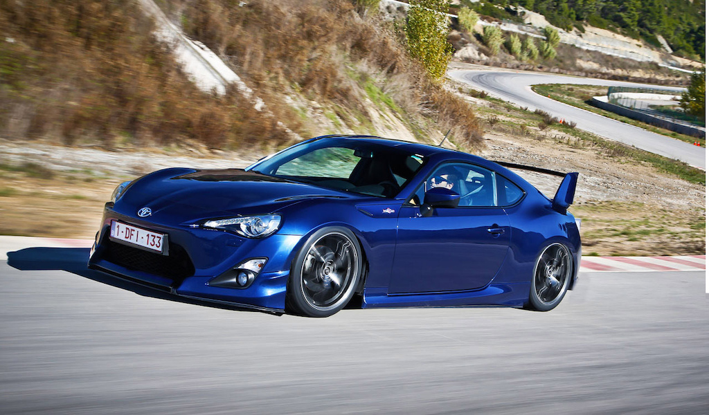 2014 FR-S, how it should be done. lowered, flat baron the wing and got rid of that stupid fin on the wing.