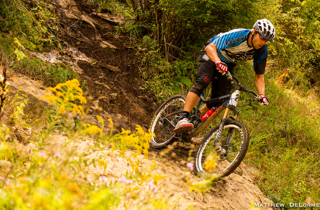 This picture was shot by Matt DeLorme at the Mountain Creek King of the Mountain Enduro this past September. This was the final stage and I knew if I had a solid run I had a good shot of finishing in first place. I m not sure if I m gasping for breath or letting out a sigh of relief because when I got to this point I knew the most difficult parts of the track were behind me. I ended up finishing first and I plan to do some more racing in the future.
