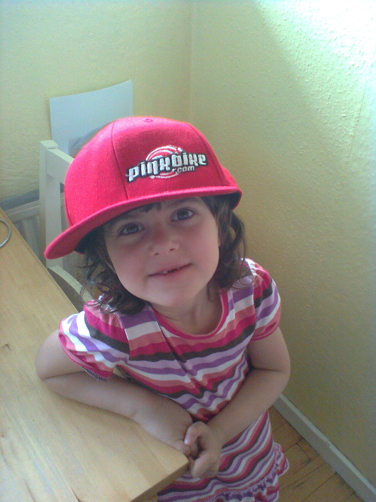 Daniella tries on the PB hat from Tippie.