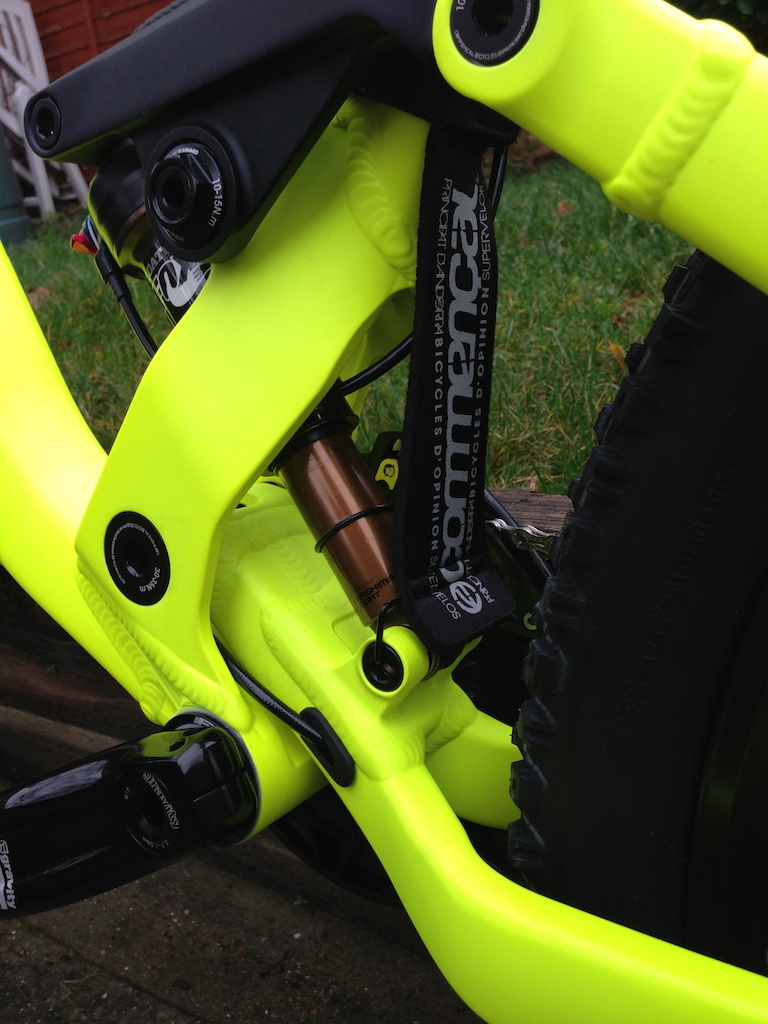 A shot of the commencal supplied rear shock mud guard