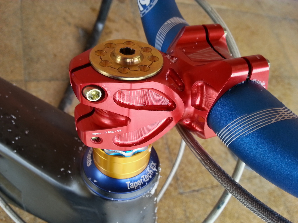hope red stem with gold ti bolts and cap/bolt