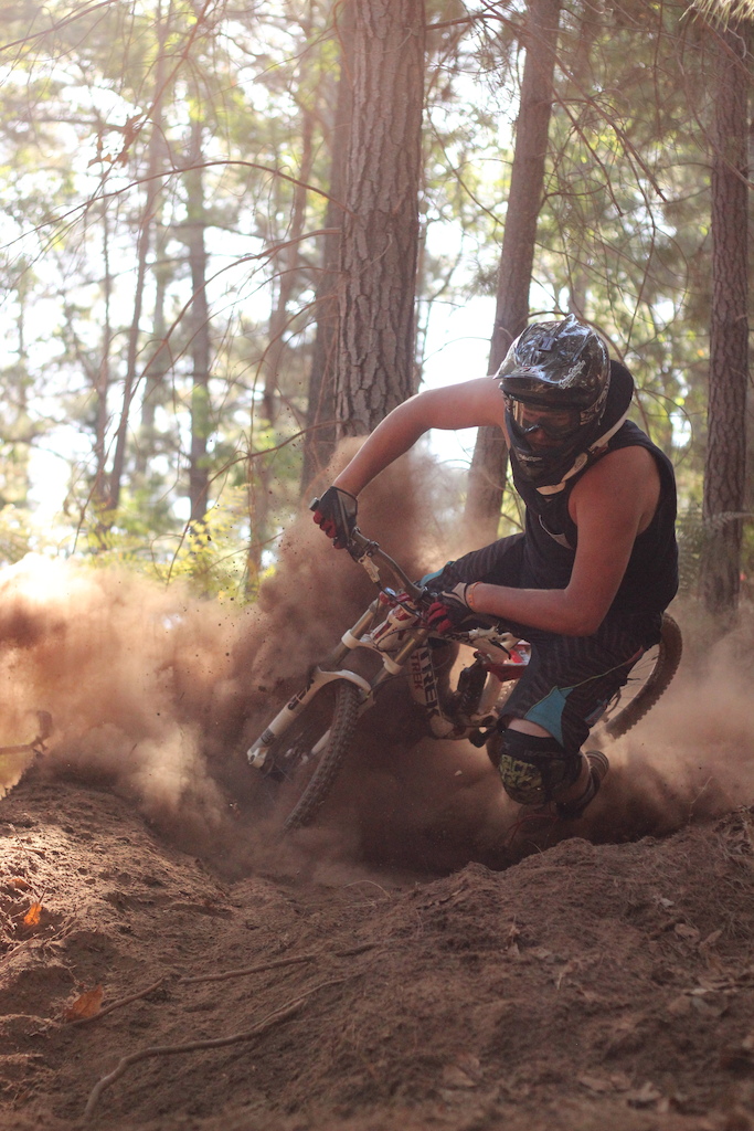 half a tyre deep in dirt