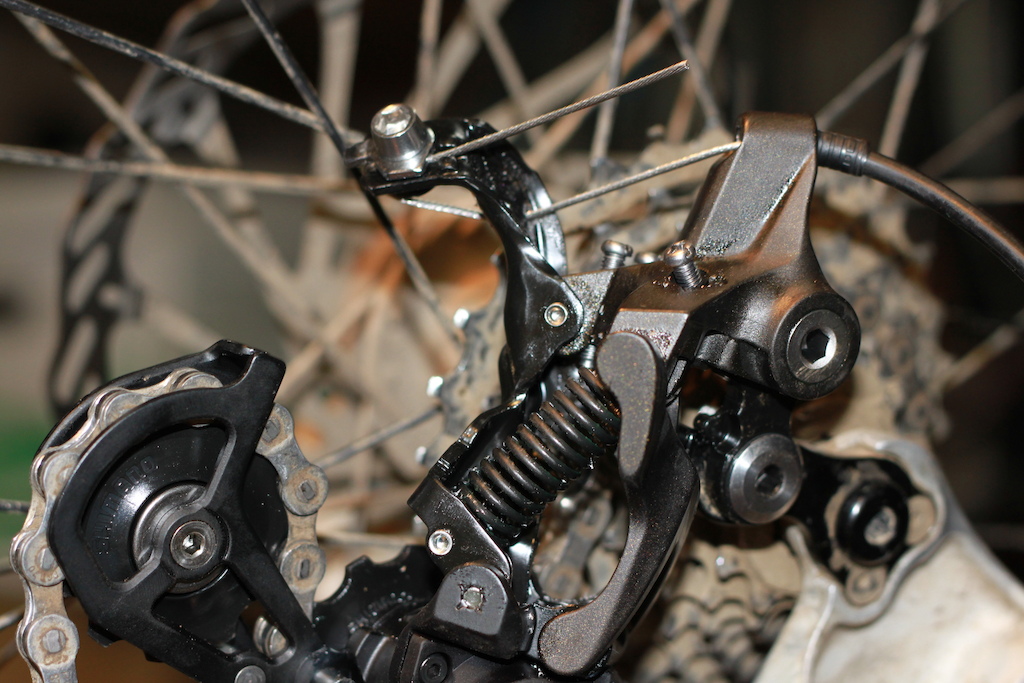 10 Speed Zee Clutch derailleur.  Hole changes cable leverage, so it works with Shimano 8/9 speed shifters.