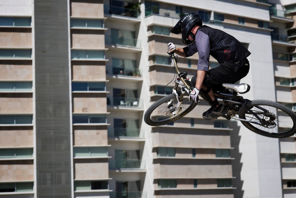 Flow testing the large jump line at the new bike park in the urban setting of San Pedro, Monterrey.