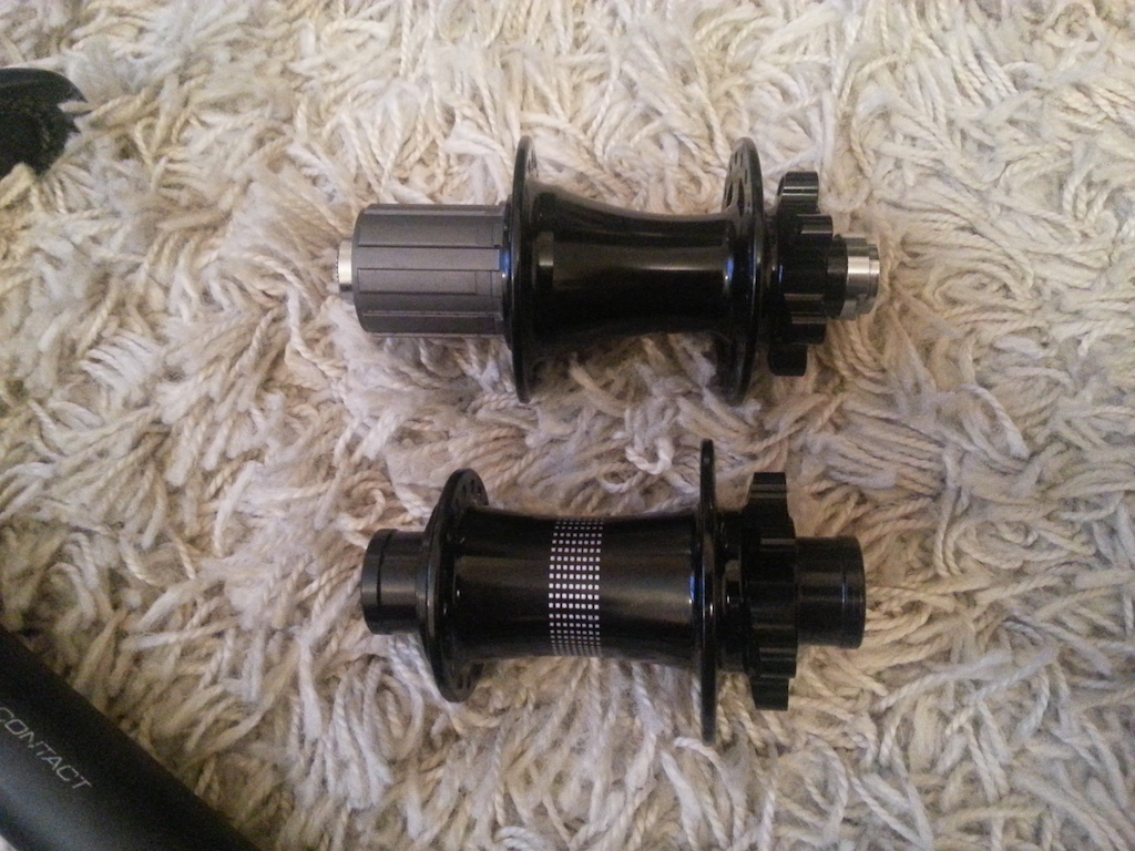 Front Hub: Specialized Hi Lo disc, laser-etched logo, sealed cartridge bearing, 20mm thru-axle, 36h

Rear Hub: Specialized disc, bolt-on 135mm, 36h

Asking price - £60 for both