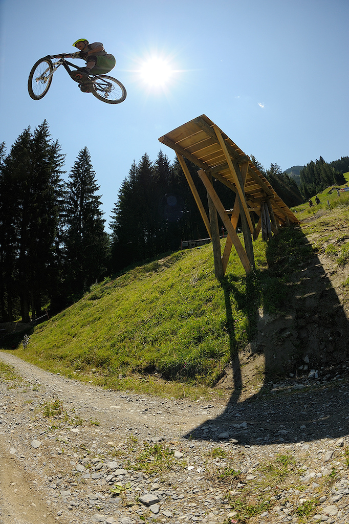 Tippie hucking his meat on the Saalbach road gap during a 10 min break from announcing at the Airstrike Slopestyle.