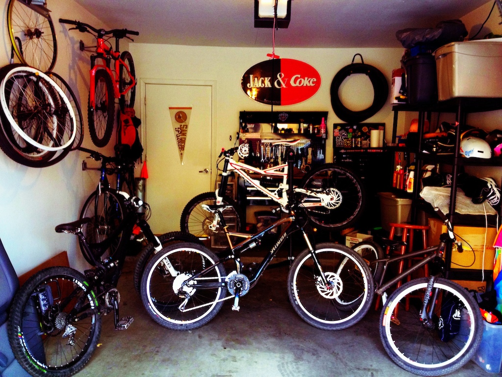 My garage, I think I needs some more bikes. Spec Status, Spec Stumpjumer, Spec SX Trail, Blk Mrkt dirt jumper, Cannnondale hardtail, and Trek commuter