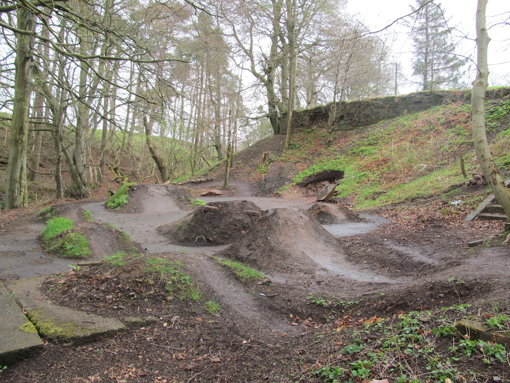 My little trials in my back garden in the may rain, mini pump track, tabletop, double, berm, small tabletop, bowl, step down