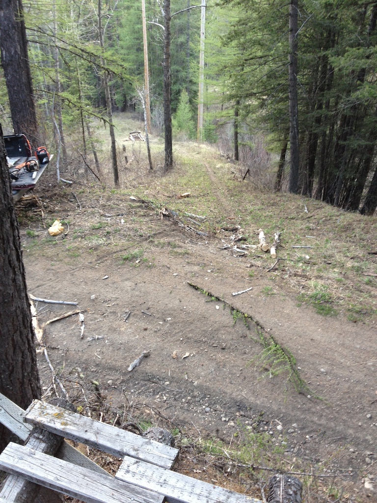 Road gap into speed check booter before good size creek gap.