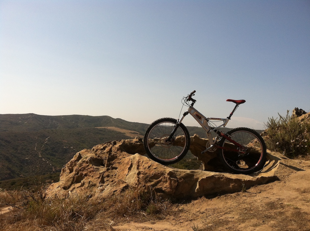 My bike on a rock formation.  Coming back up Canyon Acres after doing Telonics.