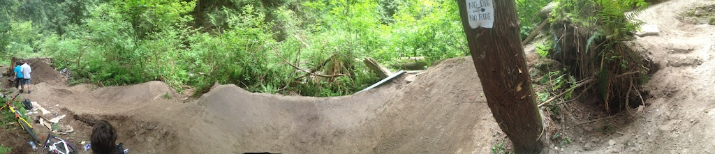 Some digging me and the boys have done! 
Featuring a 4foot left hand drop in, a berm jump, and a good ole trick jump, boner log going in soon photo looks wired cuz it's panoramic! Some gnarly vid will be coming soon!