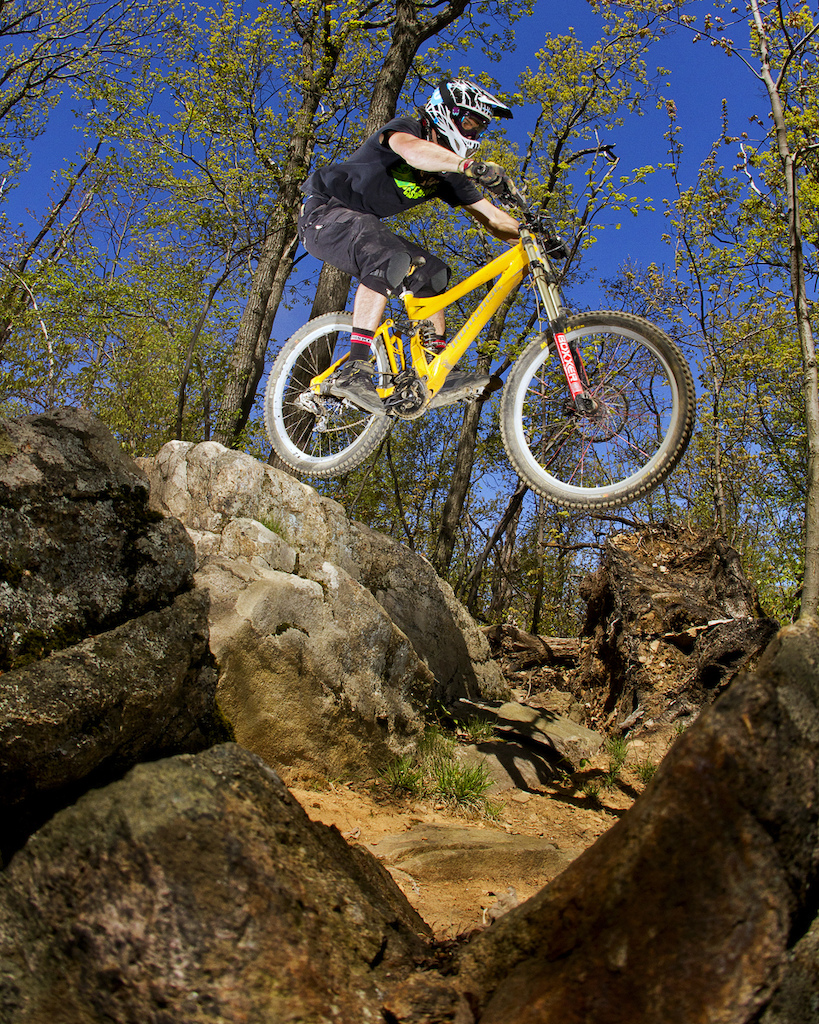 Jay Cagney launching off a drop on opening day at Mountain Creek Bike Park.