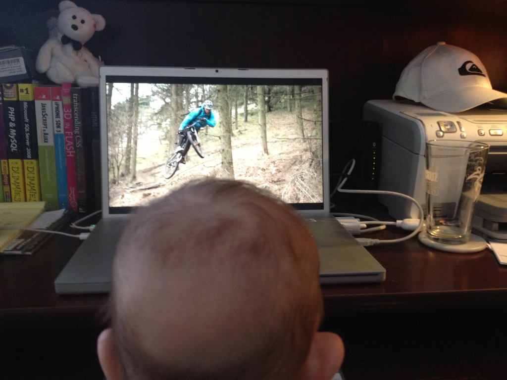 4 month-old AJ training his motor skills watching VOD on Pinkbike