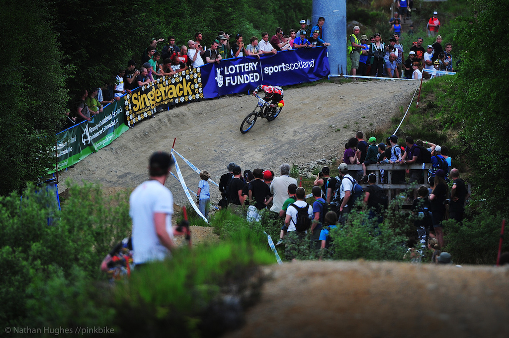 A ghost rider races in plain sight, a midst the unmatched race atmosphere of Fort William.