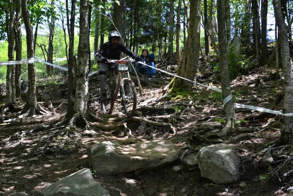 DH racing at Snowshoe. Navigating the roots and rocks on the first wooded section. Photo: Snowshoe Bike Park