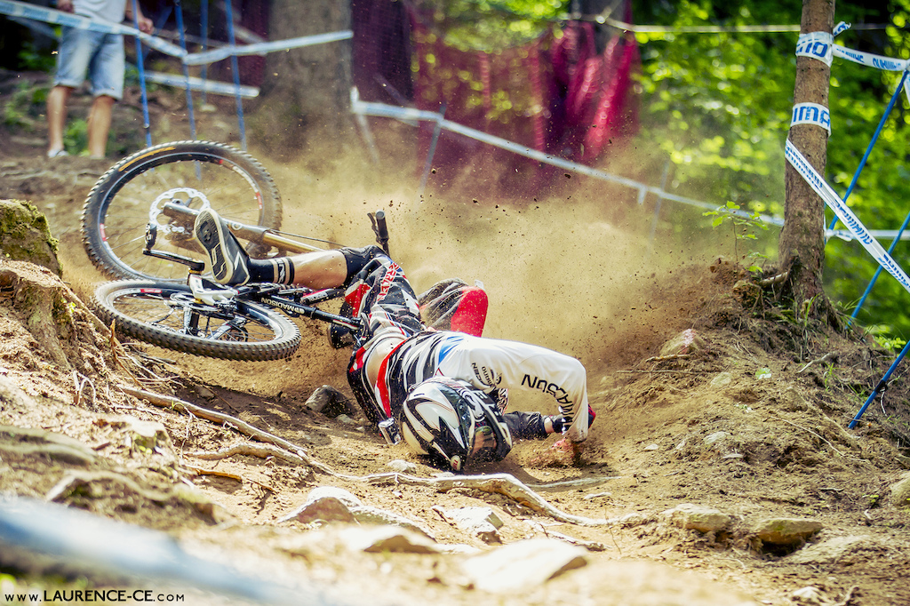 Madison Saracen rider, Harry Molloy spending a little bit of his run rolling around on the floor here at the UCI World Cup Val di Sole - Laurence CE - www.laurence-ce.com