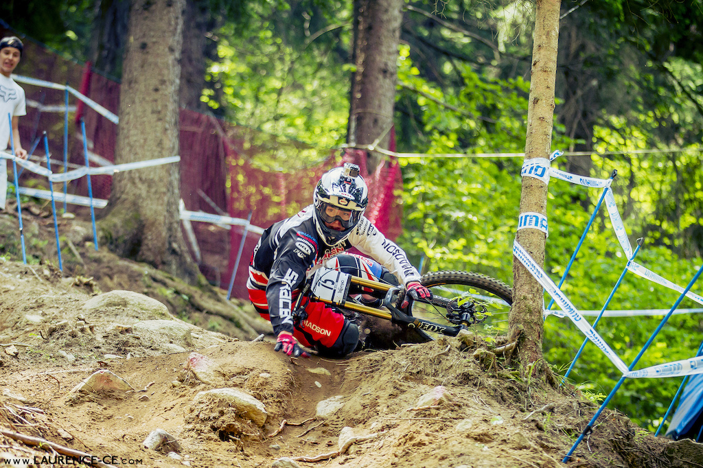 Madison Saracen rider, Harry Molloy spending a little bit of his run rolling around on the floor here at the UCI World Cup Val di Sole - Laurence CE - www.laurence-ce.com