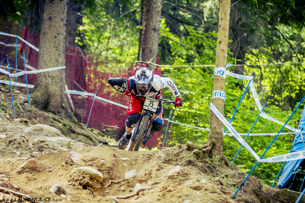 Madison Saracen rider, Harry Molloy spending a little bit of his run rolling around on the floor here at the UCI World Cup Val di Sole - Laurence CE - www.laurence-ce.com
