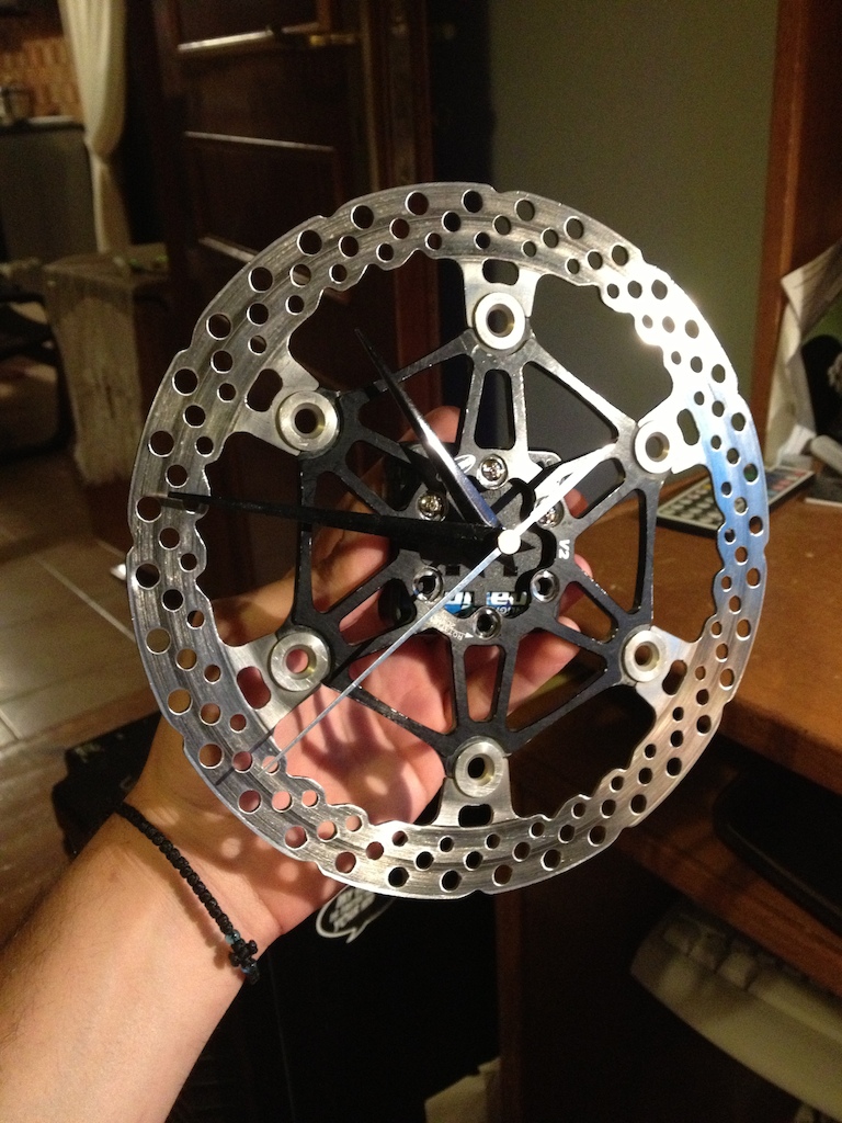 A clock I made from a Hope V2 floating rotor. Counting the time before our next ride...More photos soon with a better quartz mec.