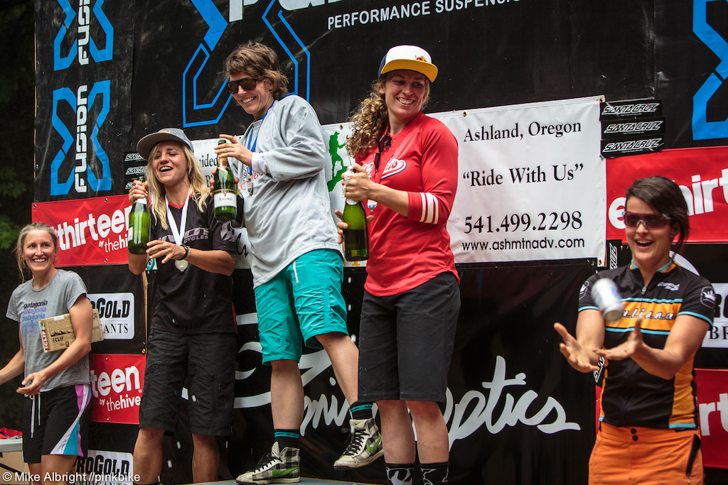 The top 3 Carolynn Rosara Jill wait while Abby right gets the now-customary beer in a can for the rest of the podium.