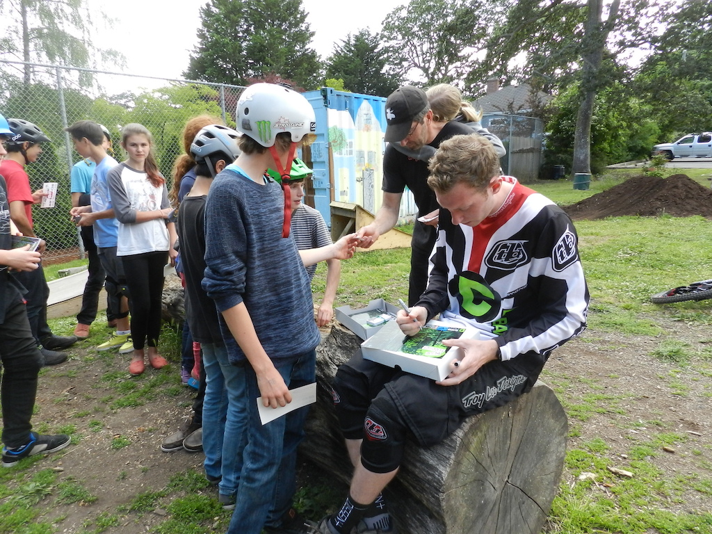 Dean signing some autographs