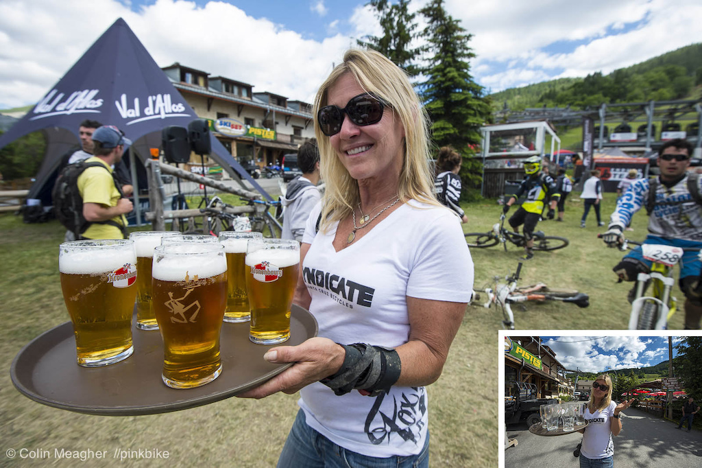 The Syndicate finish line doesn't necessarily mean the end of the day; Kathy Sessler with a full tray of glassware (and going back for more some five minutes later--the boys can take down a cold one almost as fast as they can ride bikes).