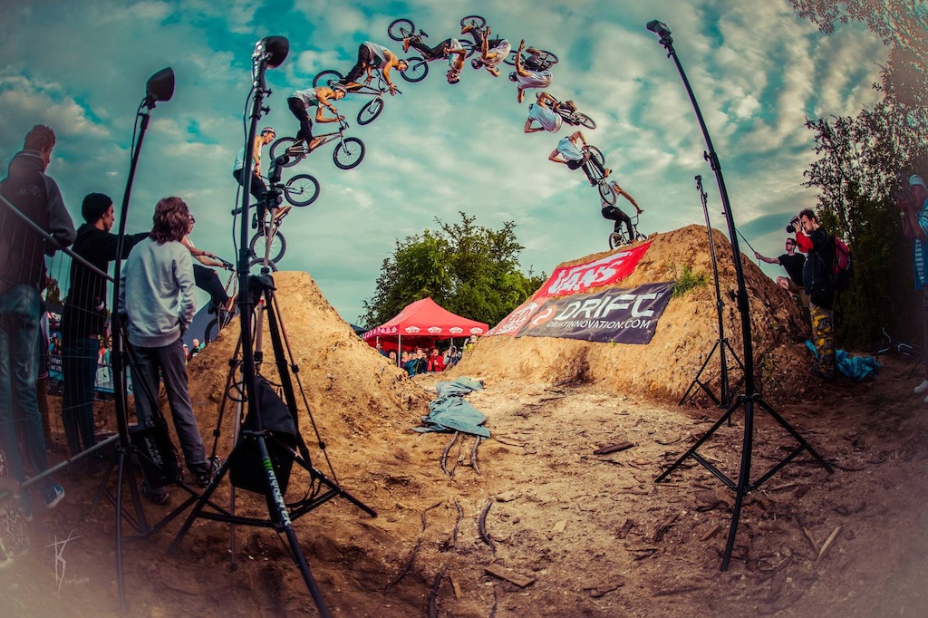 Dawid Godziek is pulling "the historical" frontflip barspin to no hand. Credit to Konwent Photography