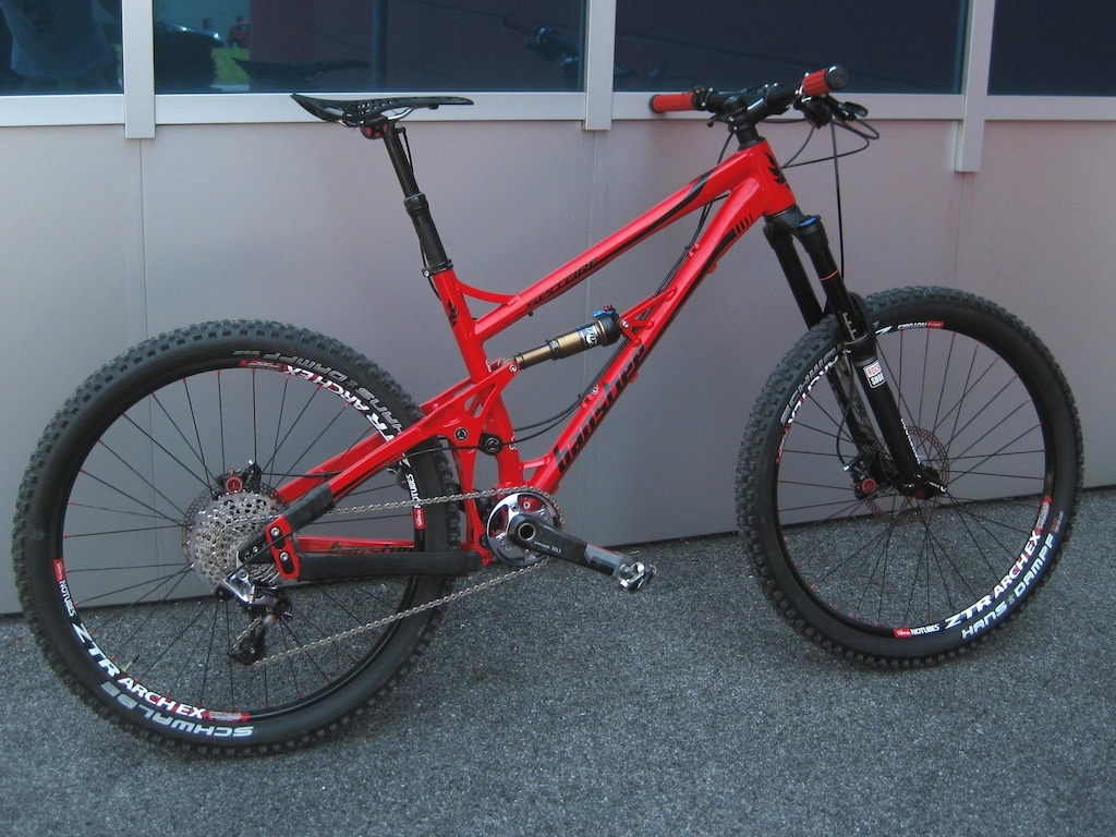 Banshee Spitfire 

V2 / XX1/ Formula The One/ Rock Shox Pike RCT3/ DTSwiss 240s &amp; ZTR Arch EX/ Specialized Blacklite/ Syntace