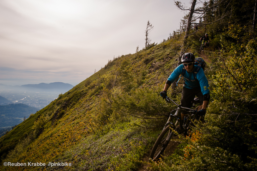 Stephen Matthews hugs into tight singletrack on the edge of Elk Mountain