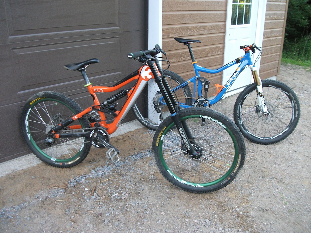 My two bikes. '08 Devinci Wilson 3 and '11 Opus Clutch 3.
