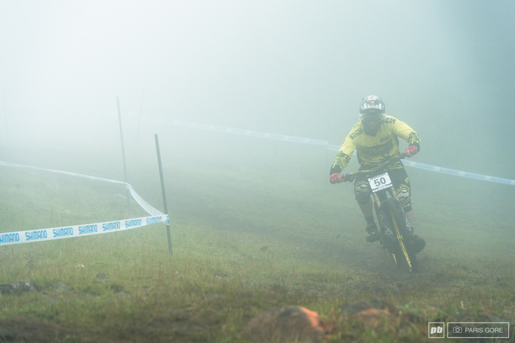 Mitch Delfs appearing out of the misty mountain top.
