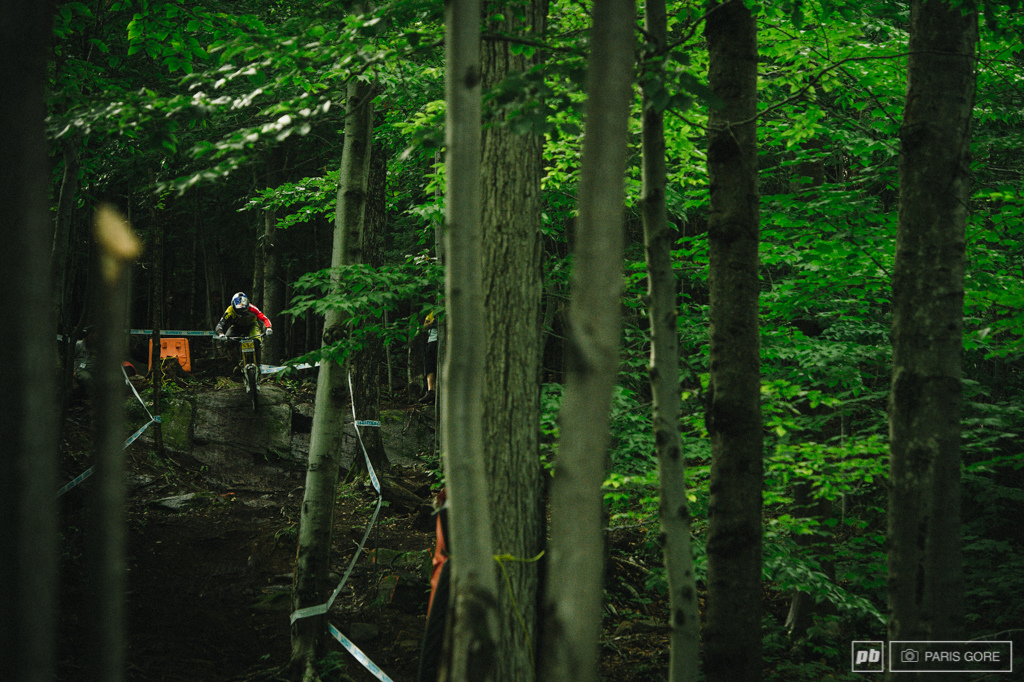 Gee Atherton sniping through the lower rock section.