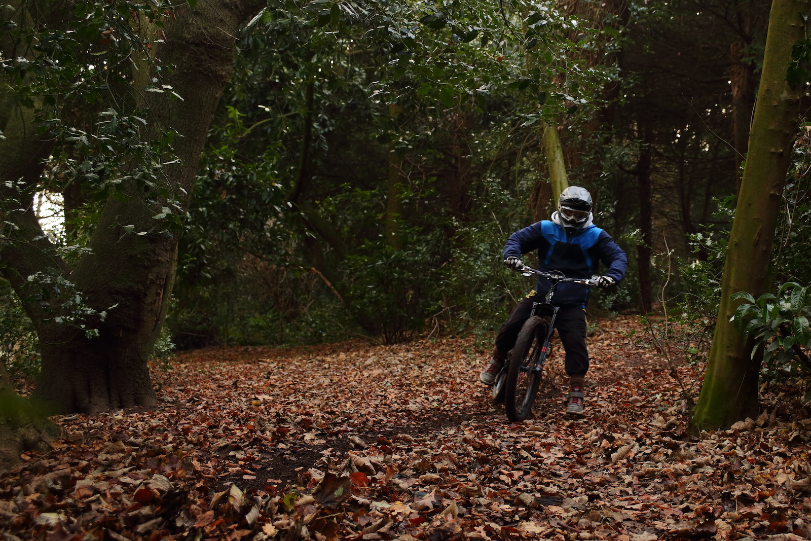 Self portrait of me riding through the woods at the top of darley abbey park.