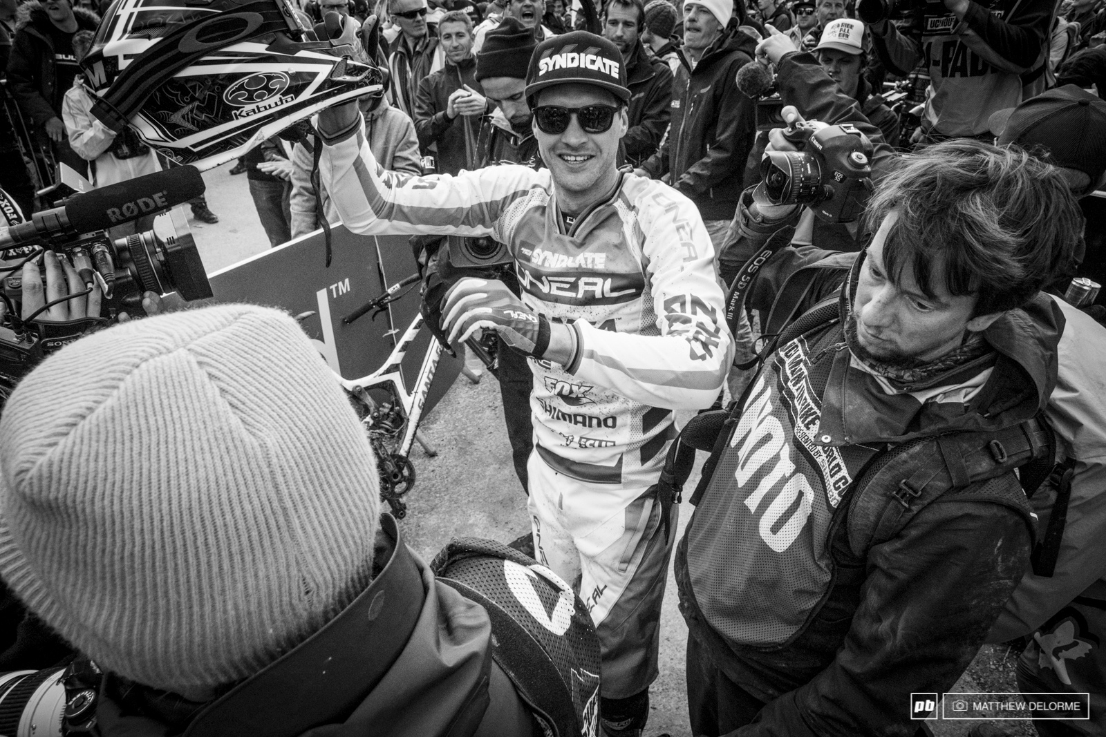 Greg makes his way through the media blitz in the finish corral.