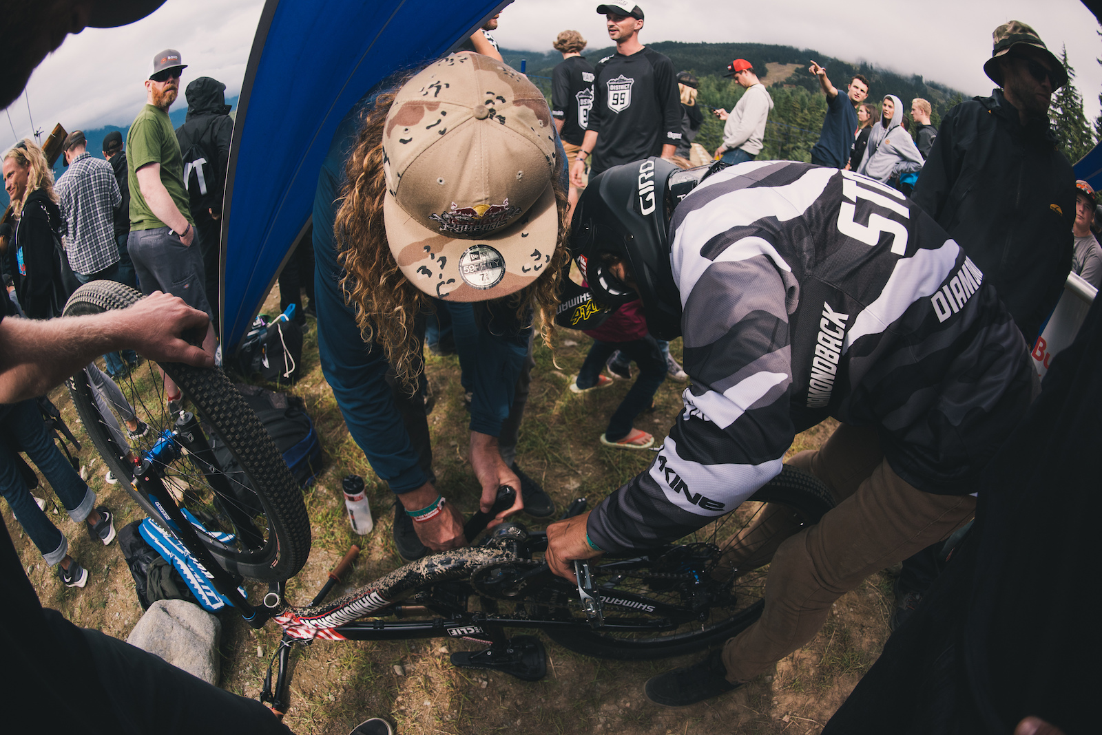 Kelly helps his fellow friend and ex-teammate Carson Storch fix a broken crank during Crankworx. Kelly knows a thing or two about fixing busted cranks. Even though they were on separate teams Kelly was a friend to everyone and happy to help.