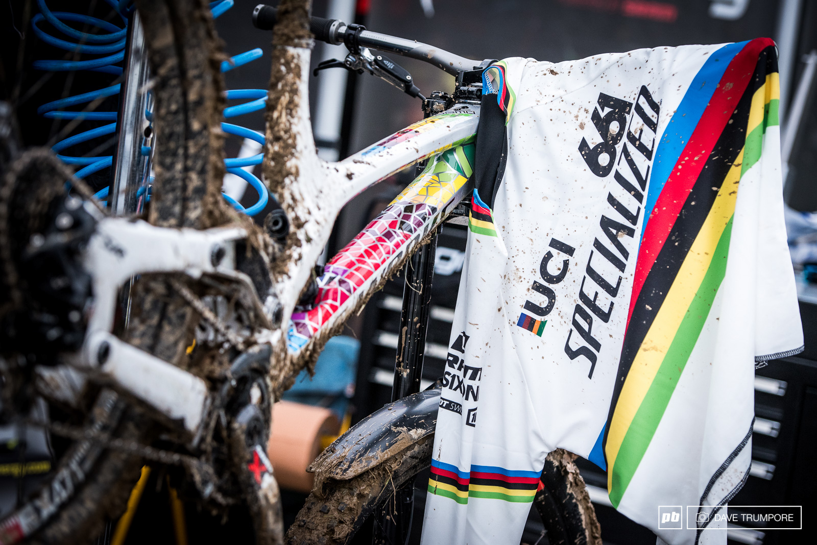 Logic finally got to christen the rainbow jersey with a mix of Lourdes holy water and divine mud.