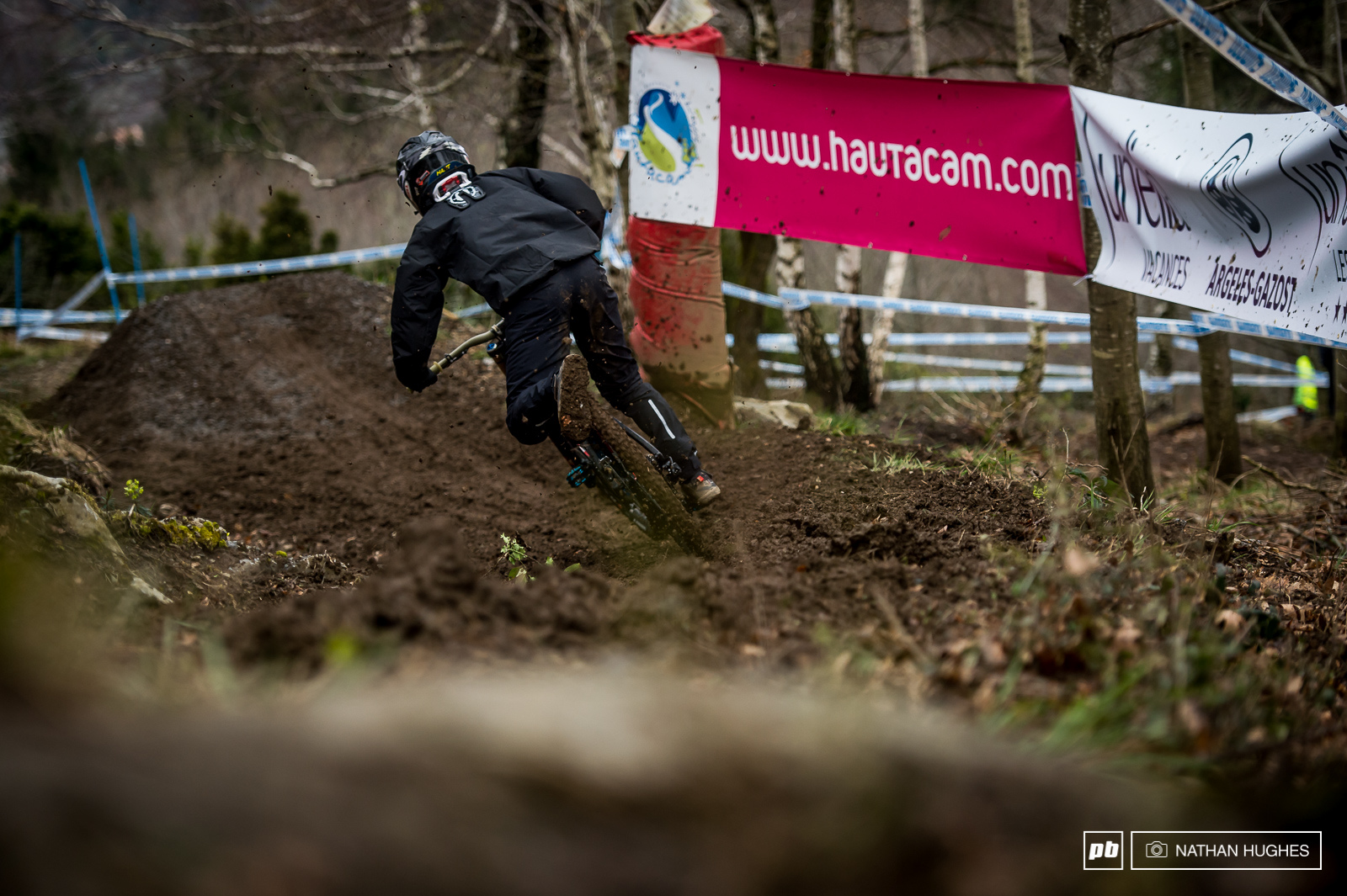 The track was running super slow and sticky making it mighty difficult to carry speed from section to section. There were big names riding a tamer than usual some almost creeping by unoticed under their blacked-out mud gear.
