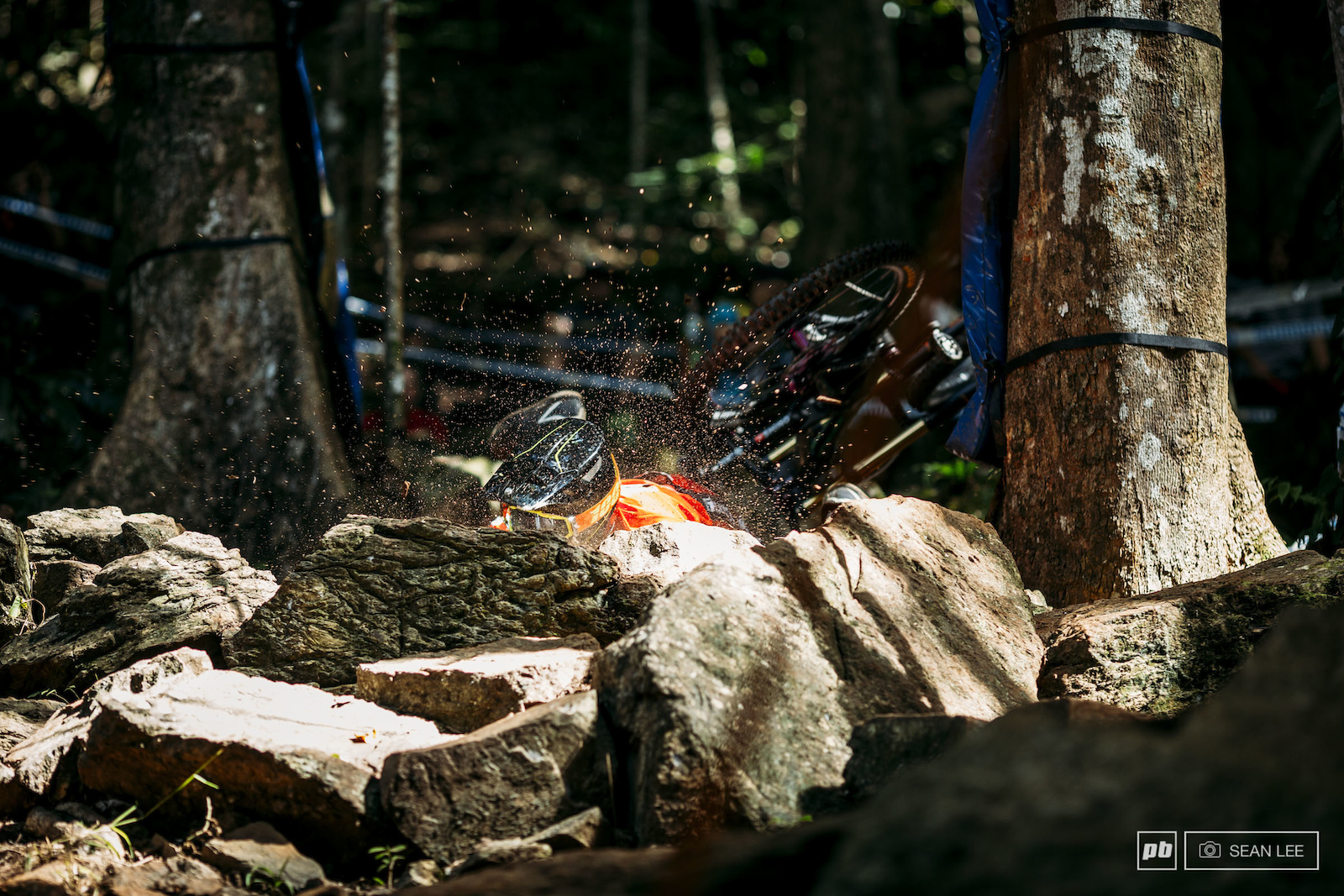 As fun as it seems slamming your face into the ground definitely isn t the fastest line through this rock garden. The crowd started chanting the number of seconds that it took this poor guy to scrape himself off the ground until he got back on his bike 14 seconds later.