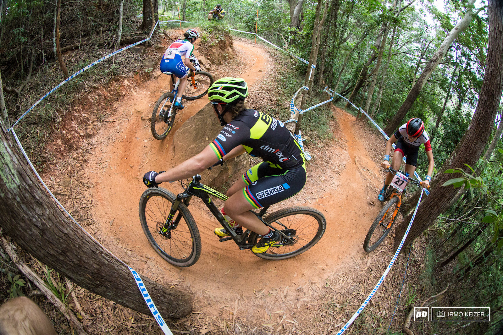 The women battle during the first laps of the course on the narrow trails of Cairns.