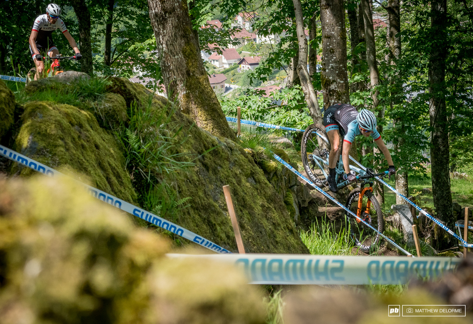 Bec Henderson riding the stairs of one of the old stone walls that perforate the hill side.