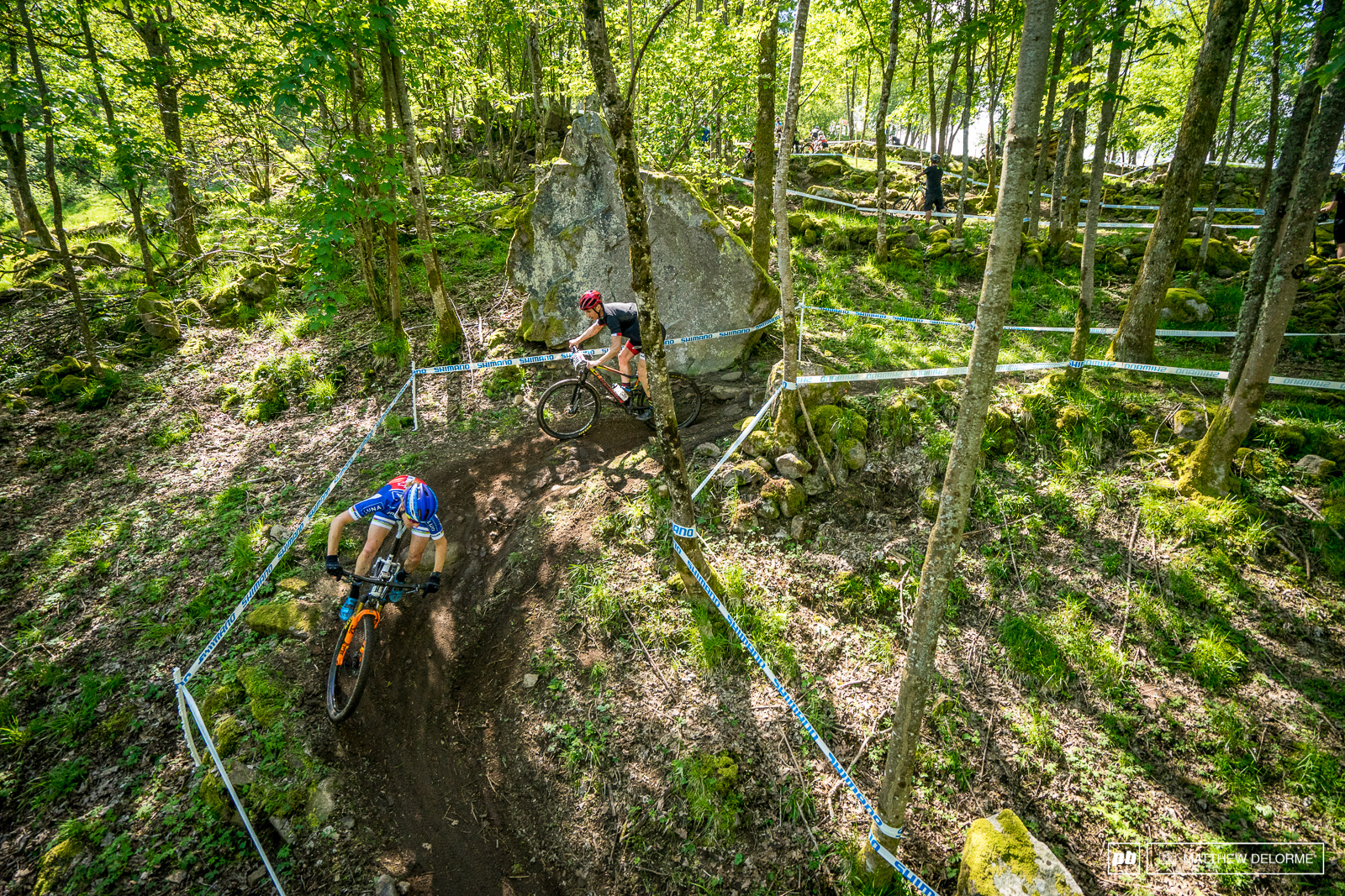 Catharine Pendrel weaving her way through the lush green on top of the track.