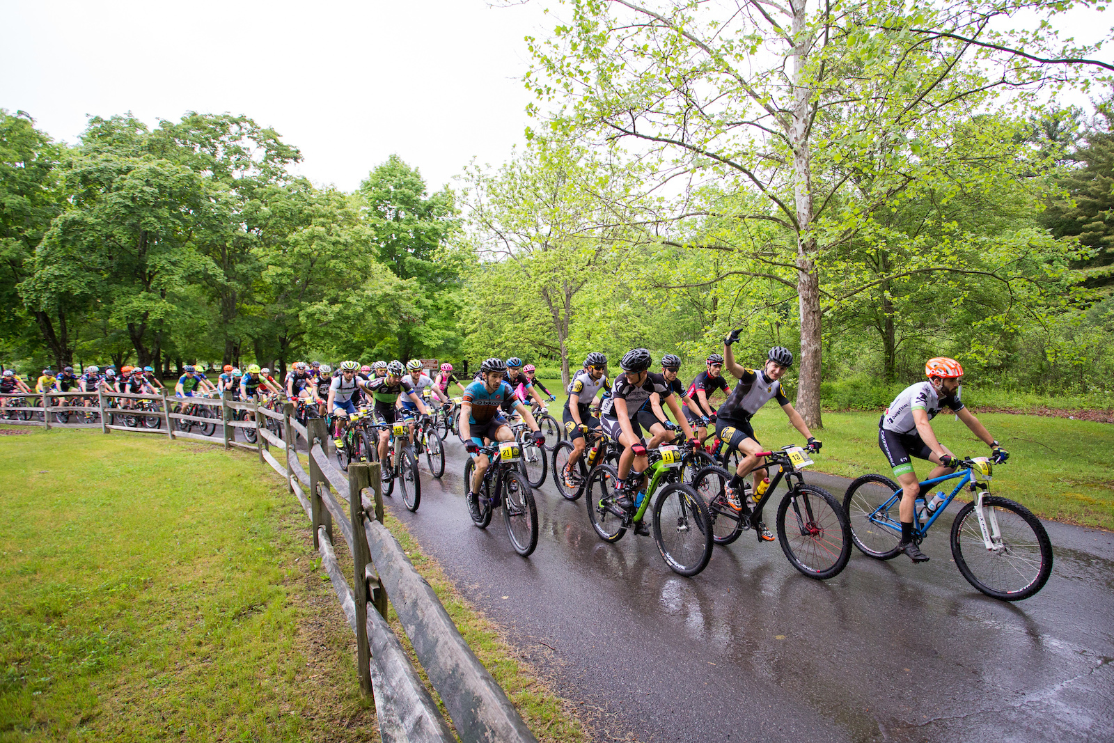 The peloton rolls out for the fifth and final time at the NoTubes Trans-Sylvania Epic. The rain held off for the start, but a 45-minute deluge drenched racers and trails mid-stage, making the rocks even more challenging than usual.