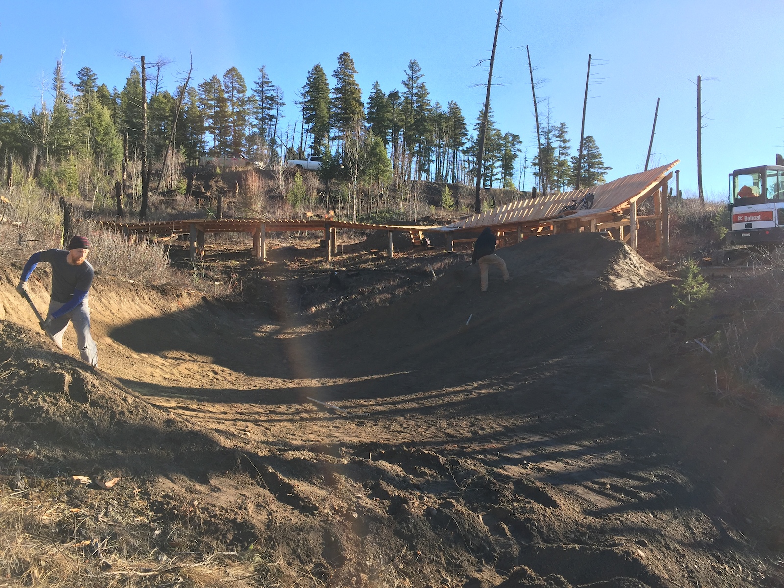 "The Seperator" technical trail feature is finally completed. Big structure, lots of lumber, lots of work but super fun. Splits the trail into two lines. Option 1, gap jump, takes you into a sweet gully and option 2, wallride, takes you along a few hip jumps and a bench cut trail section.